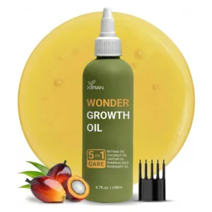 Bottle of Wonder Growth Oil with batana, coconut, castor, pumpkin seed, rosemary oils, and an applicator tip included.